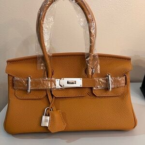 Genuine Leather Shoulder Bag, size 29, with silver hardware.